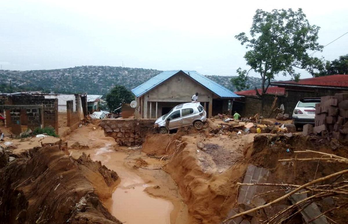 A car is seen after heavy rains caused floods and landslides, on the outskirts of Kinshasa, Democratic Republic of Congo on  December 13, 2022.