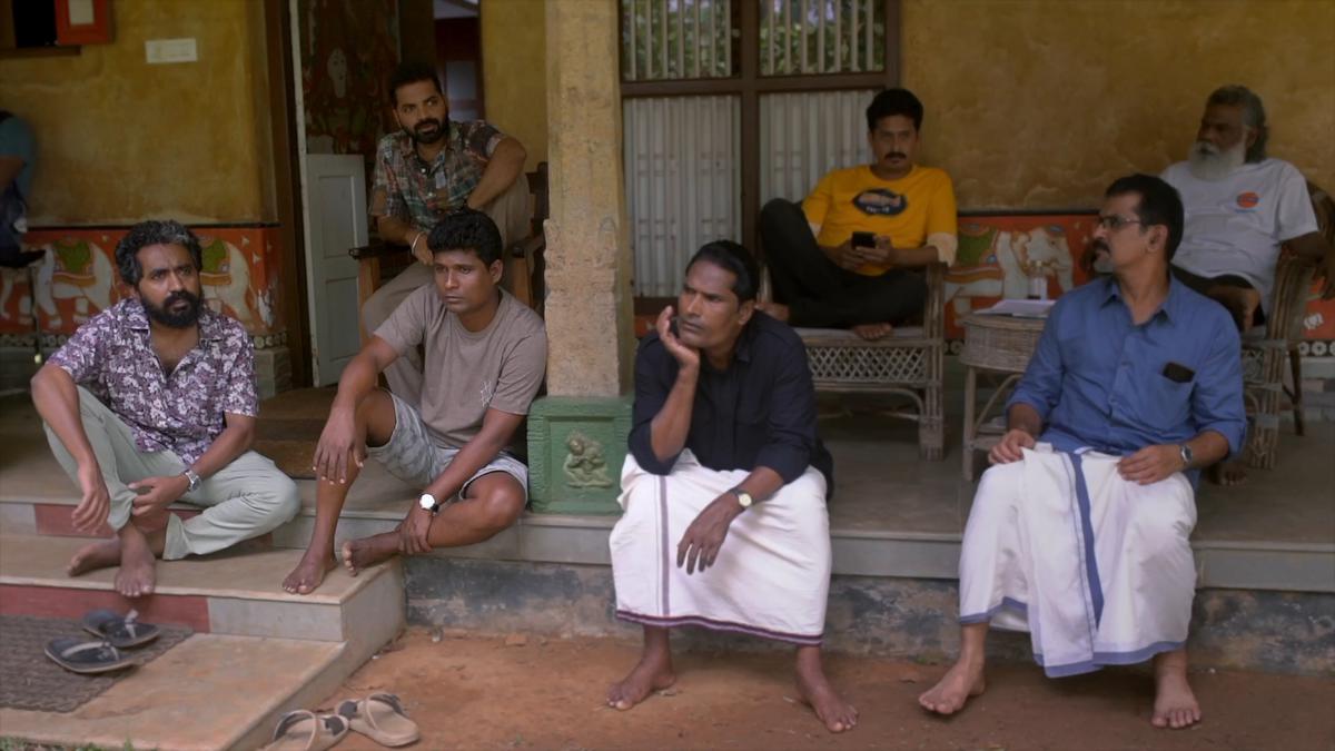Anand Ekarshi with some of the actors of Aattam.