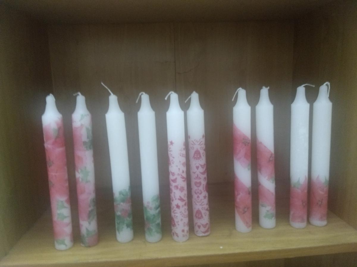 Tapered scented, decorated candles made by Anna Thomas under her label Candle With Care. 