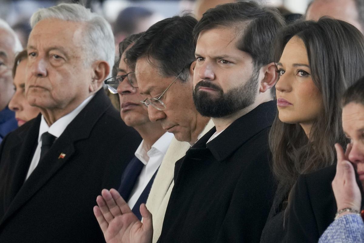 Leaders, from left, Mexico’s President Andres Manuel Lopez Obrador, Colombia’s President Gustavo Petro, Bolivia’s President Luis Arce, Chile’s President Gabriel Boric and wife Irina Karamanos attend a ceremony marking the 50th anniversary of the 1973 military coup that toppled the government of late President Salvador Allende at La Moneda presidential palace in Santiago, Chile, on September 11, 2023. (AP Photo/Esteban Felix)