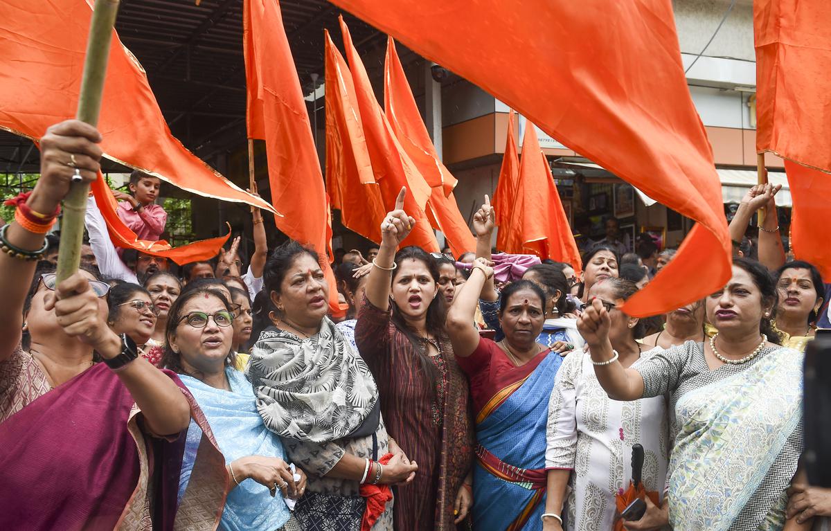 Shiv Sena supporters shout slogans backing Uddhav Thackeray outside Shiv Sena Bhavan on June 21.