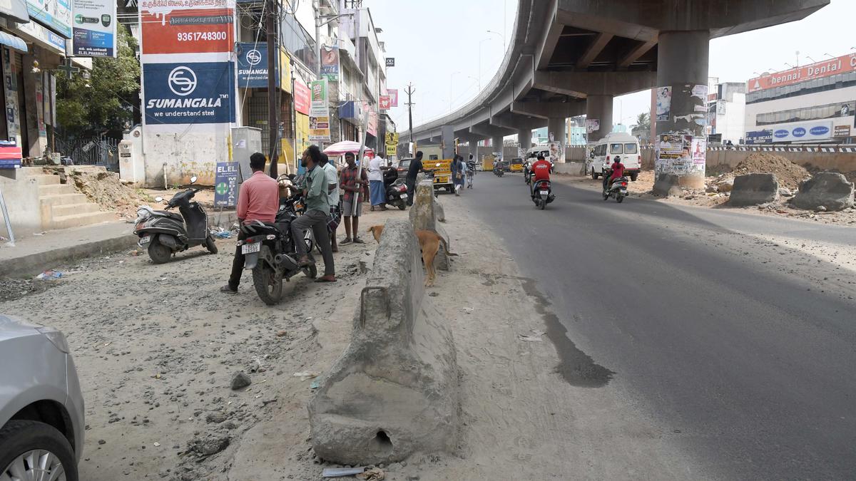 Motorists want the service lane under Medavakkam flyover to be finished soon