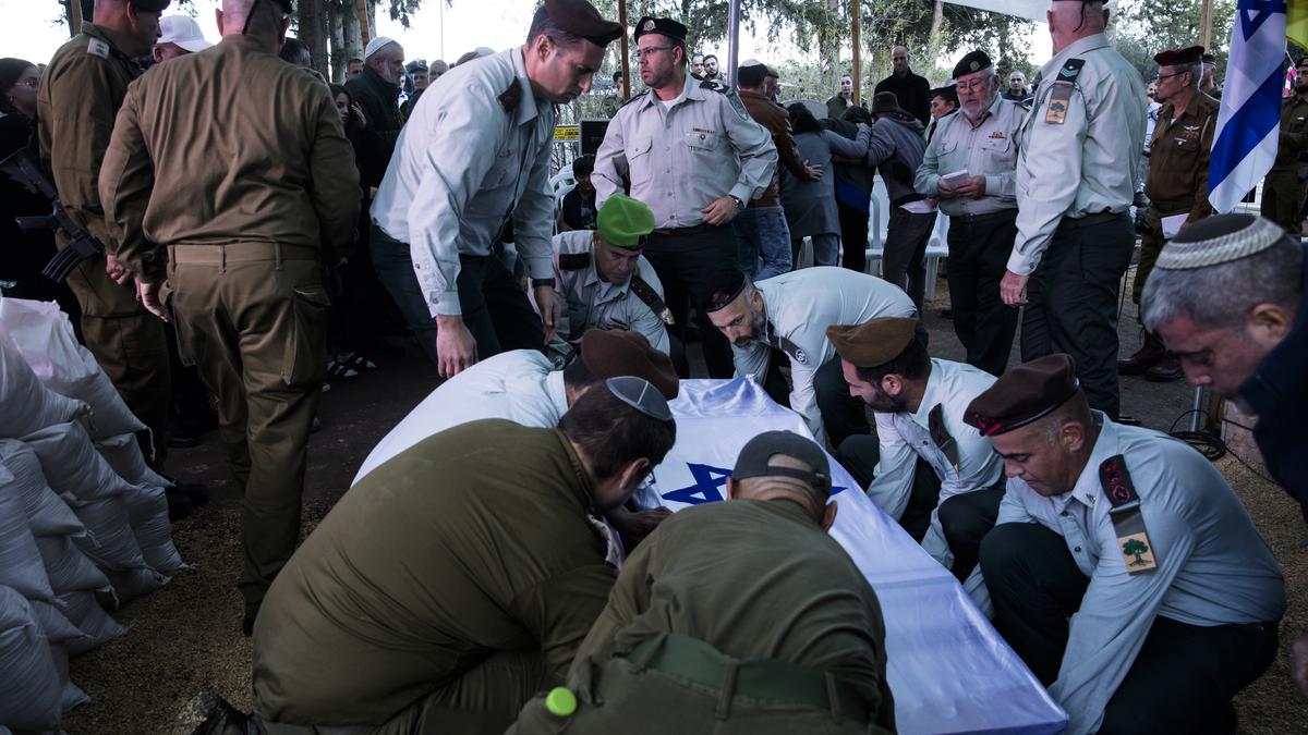 Ambush kills nine Israeli soldiers in Gaza City, where battles rage weeks into devastating offensive
