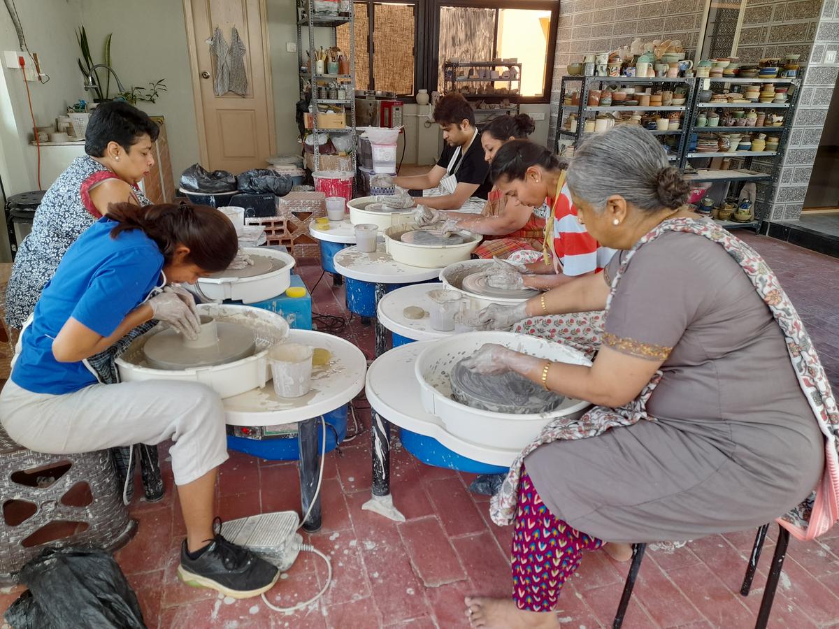 Various stages of pottery making