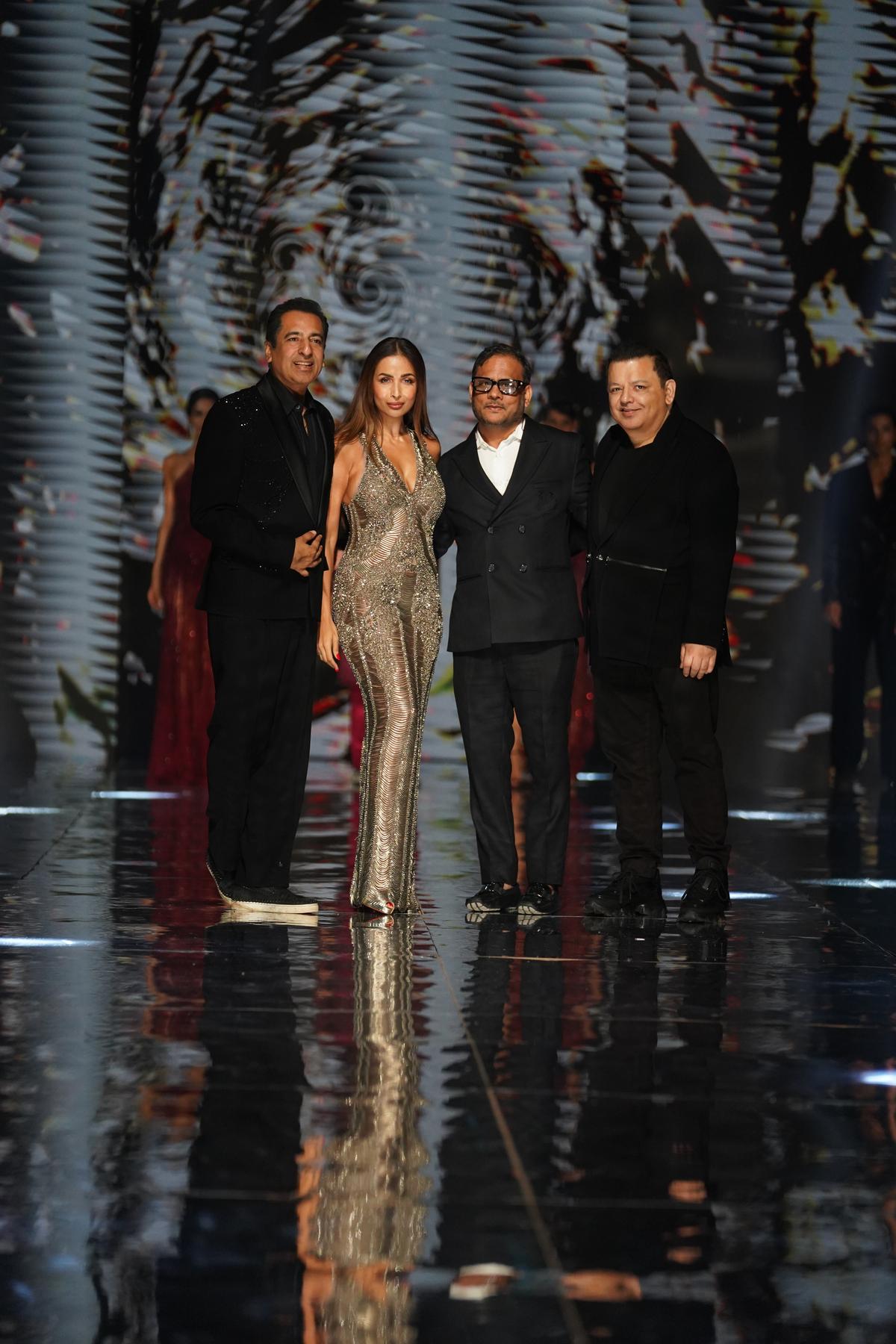 Rohit Gandhi, Rahul Khanna with Malaika Arora