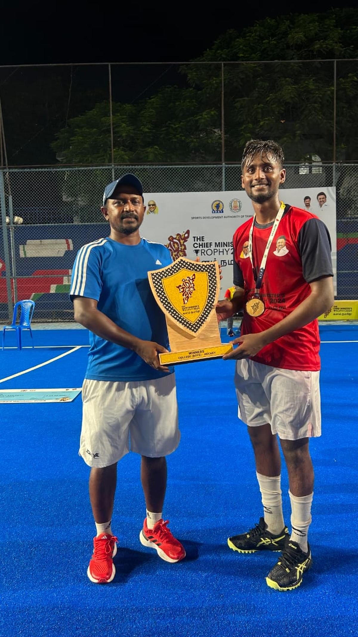 V. Aravind (right) with coach N. Muthu Kumar