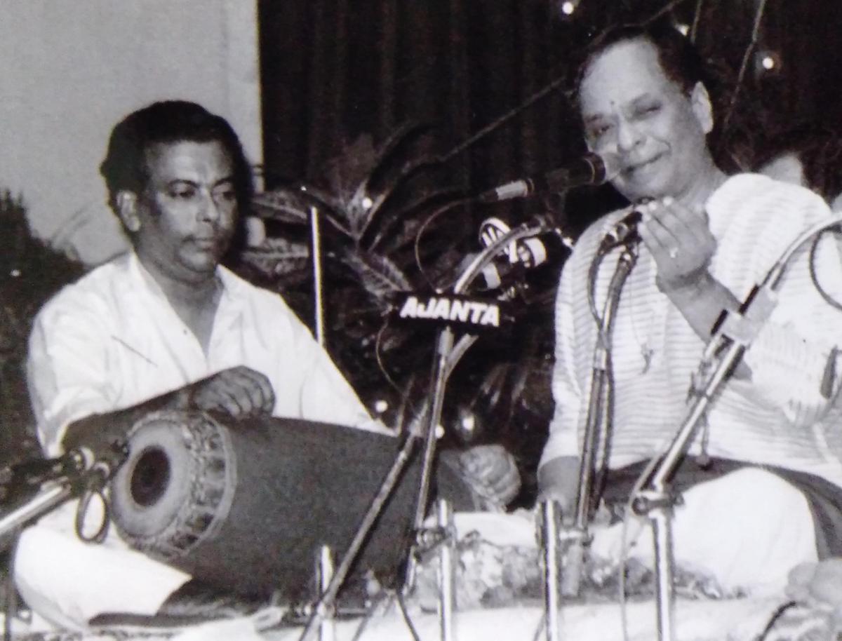 Surendran accompanying M. Balamuralikrishna. 