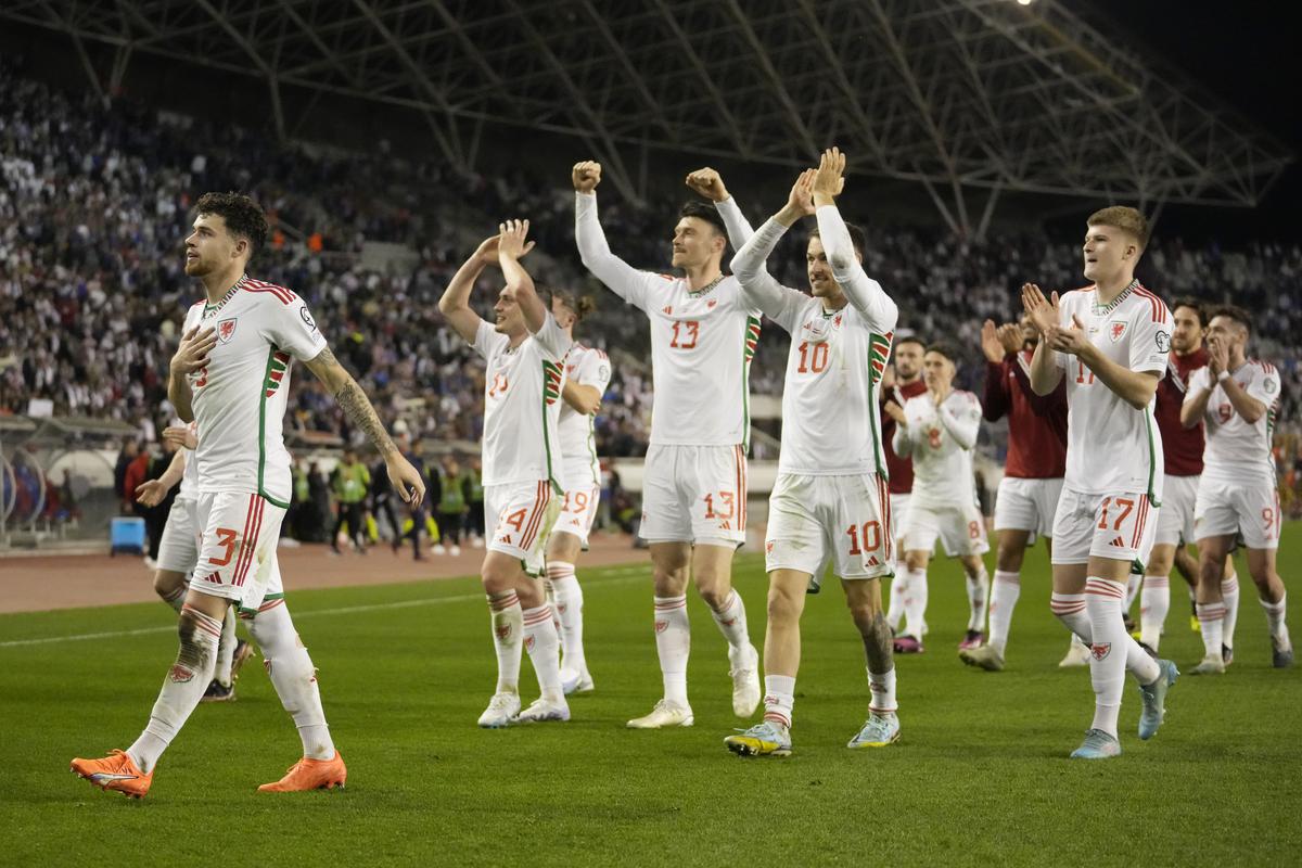 Wales’ players wave their supporters at the end of the Euro 2024 group D qualifying soccer match between Croatia and Wales at the Poljud stadium in Split, Croatia, Saturday, March 25, 2023.