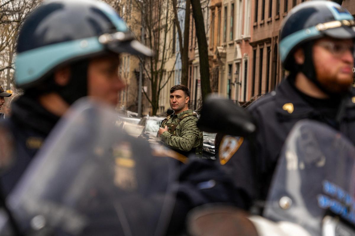 Far-right activist Jake Lang stands outside Gracie Mansion, the official residence of New York Mayor Zohran Mamdani, during an anti-Islam protest which also drew counter-protesters on March 7, 2026.