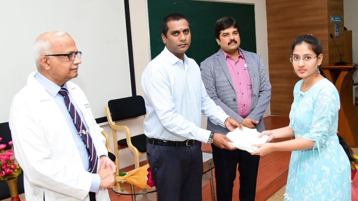Chittoor Collector distributes aprons to MBBS students at Apollo Medical College