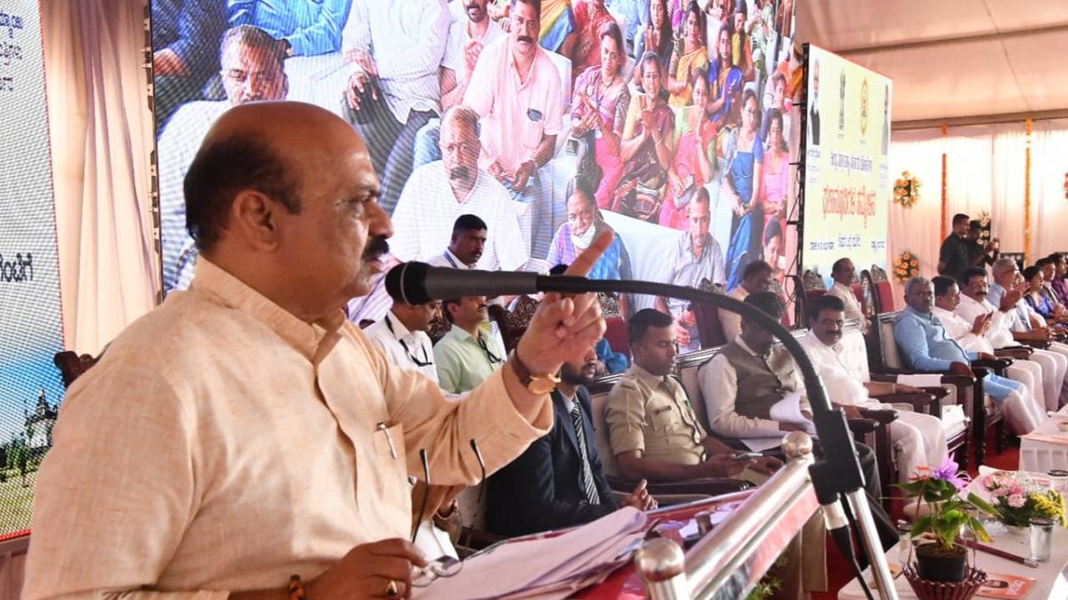 Karnataka CM distributes title deeds to beneficiaries in Bengaluru Urban and Rural districts
