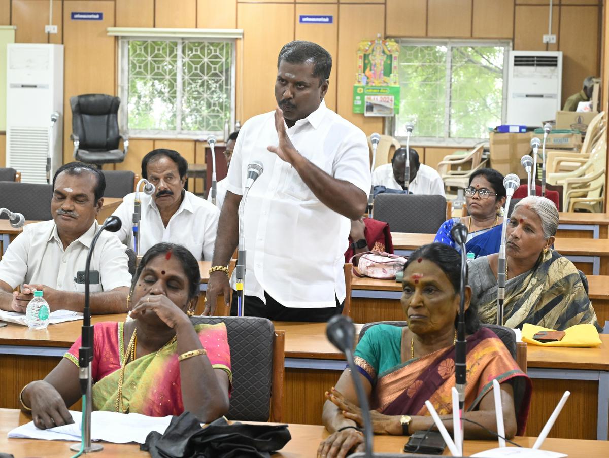 AIADMK councillor speaking at the corporation Council meeting in Thoothukudi on Friday. 