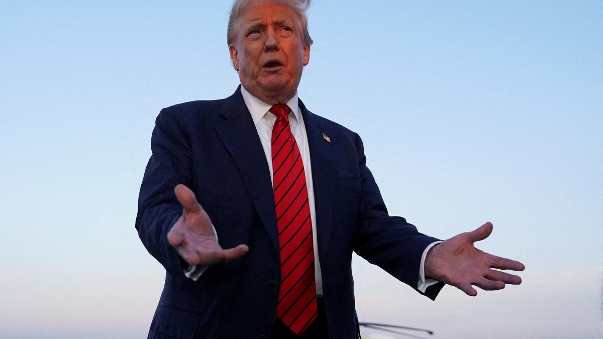https://th-i.thgim.com/public/incoming/czwk6w/article69897578.ece/alternates/LANDSCAPE_1200/2025-08-04T172648Z_1089103541_RC2ZZFAOOJ8M_RTRMADP_3_USA-TRUMP-ECONOMY.JPG