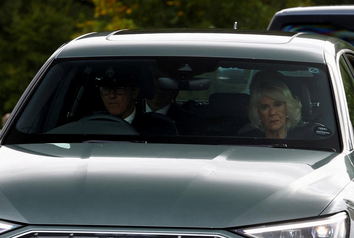 A vehicle carrying King Charles and Queen Camilla leaves Balmoral Castle, following the passing of Britain’s Queen Elizabeth, in Balmoral, Scotland, on September 9.