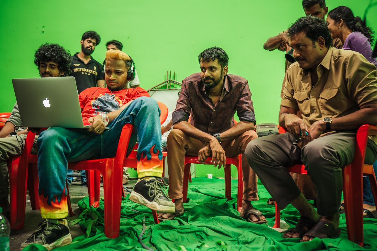 Basil Joseph and with director Sivaprasad and actor Suresh Krishna on the sets of Maranamass Basil Joseph and with director Sivaprasad and actor Suresh Krishna on the sets of Maranamass