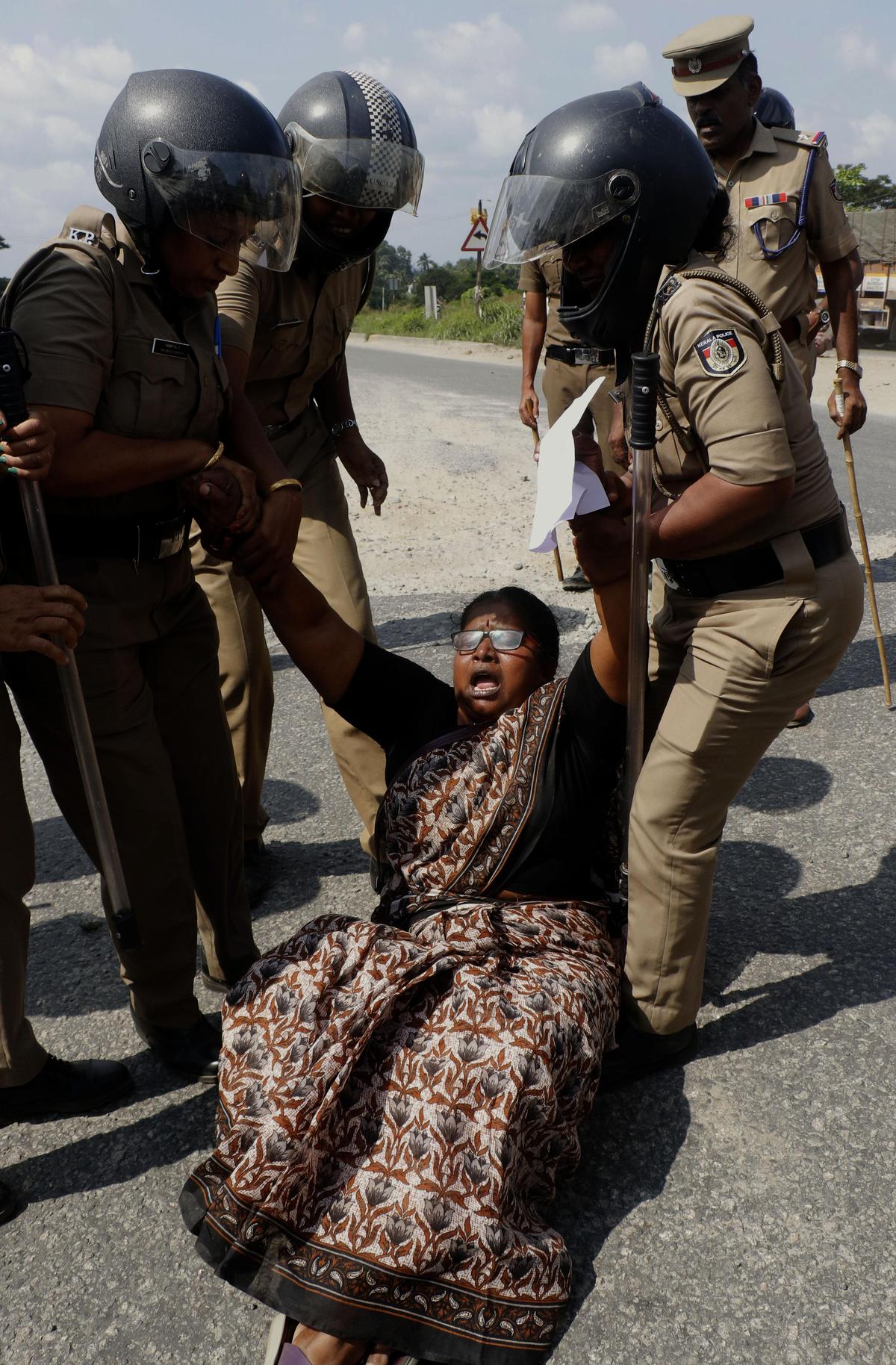 Police detaining members of the Palakkad district committee of the National Janata Dal on Wednesday for blocking National Highway 544 at Kuzhalmandam, between Wadakkanchery and Walayar, during a protest. The demonstration was organised to condemn the government’s alleged attempt to deceive farmers by delaying the commencement of paddy procurement.                            