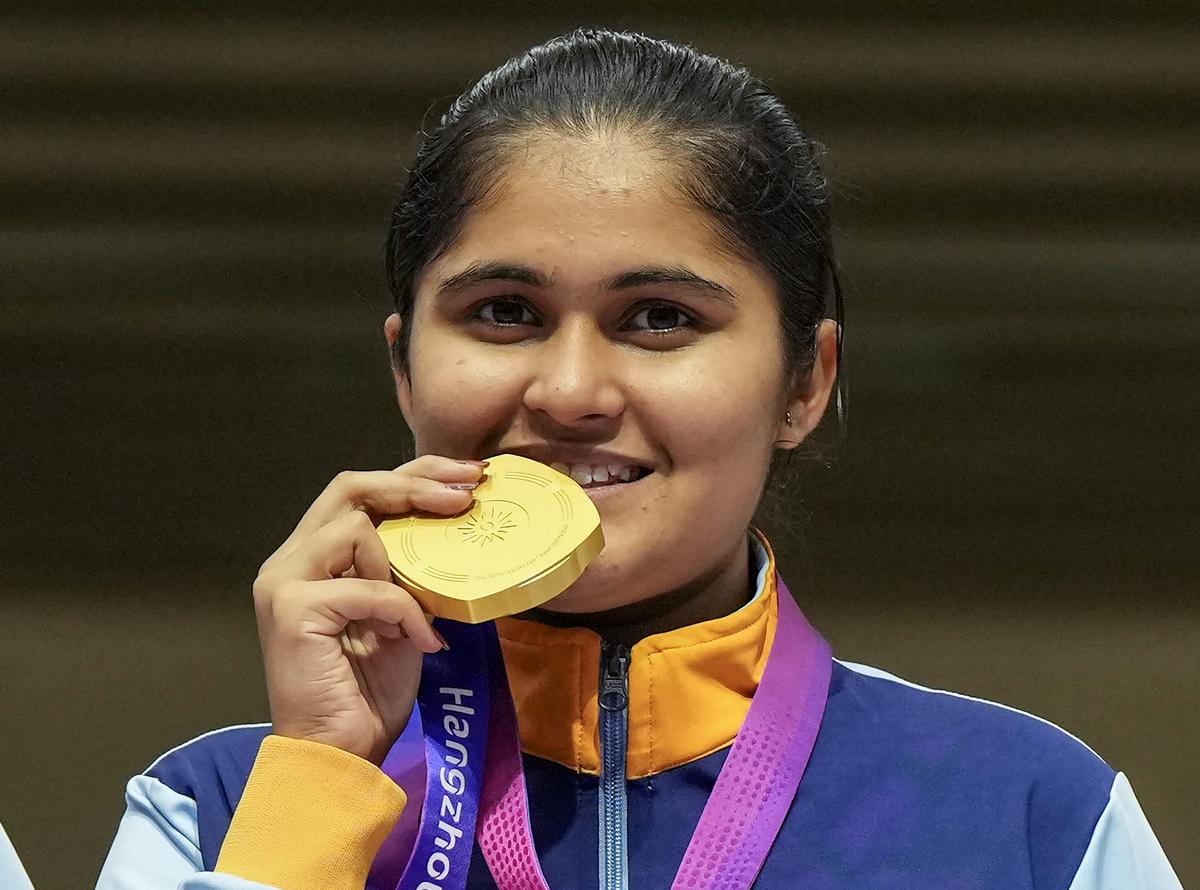 Palak poses with her women’s 10m air pistol (individual) gold at the 19th Asian Games, in Hangzhou, China, Friday, Sept. 29, 2023. 