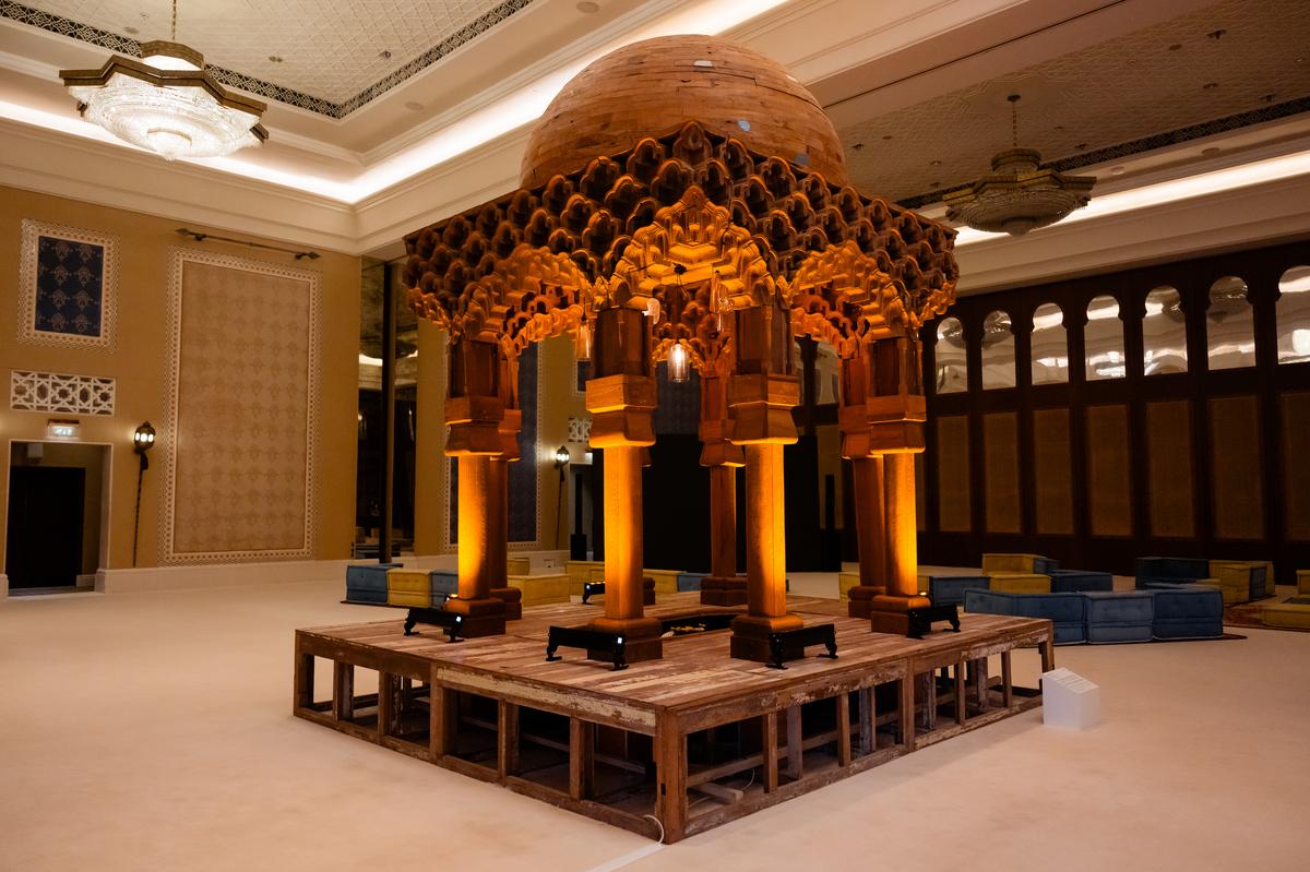 Sudarshan Shetty’s installation A Song, A Story | Sculpture I - A Public Space (2016), using recycled teak wood, lamps, water, at Art Dubai Special Edition.