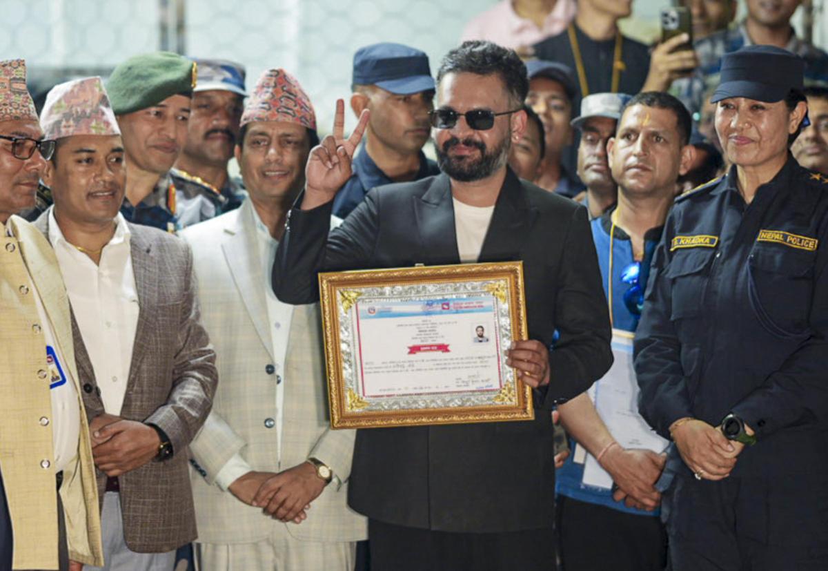 Balendra Shah, a candidate of the Rastriya Swatantra Party (RSP) from Jhapa Constituency-5, shows a certificate at the Election Commission premises after winning the constituency in the Nepal general elections, in Jhapa, Nepal, Saturday, March 7, 2026. Balendra Shah ‘Balen’ defeated four-time prime minister K P Sharma Oli by a huge margin of about 50,000 votes. Balendra Shah, a candidate of the Rastriya Swatantra Party (RSP) from Jhapa Constituency-5, shows a certificate at the Election Commission premises after winning the constituency in the Nepal general elections, in Jhapa, Nepal, Saturday, March 7, 2026. Balendra Shah ‘Balen’ defeated four-time prime minister K P Sharma Oli by a huge margin of about 50,000 votes.