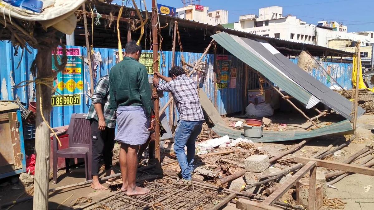 Flower market vendors object to eviction drive in old bus stand; police ensure smooth operation