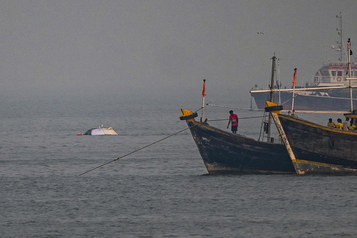 A portion of the ferry, Neel Kamal, can be seen in the Arabian Sea. 