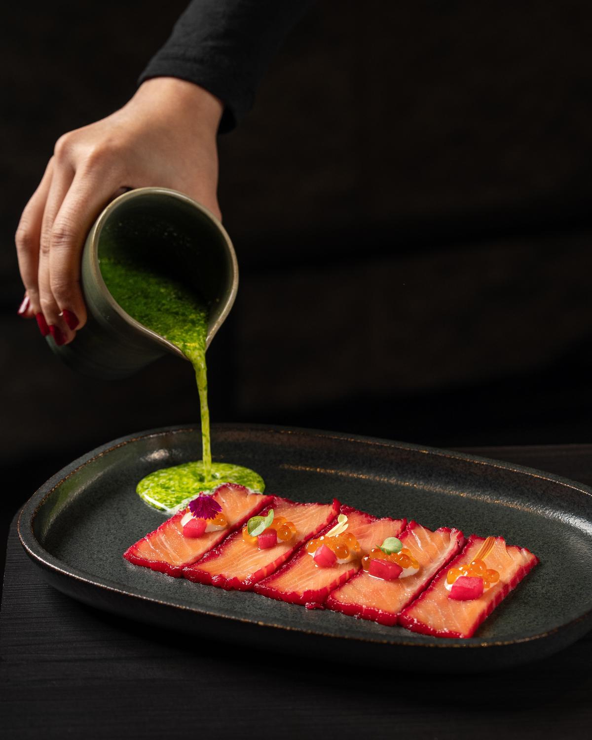 Beet cured salmon with tiger’s milk emulsion 