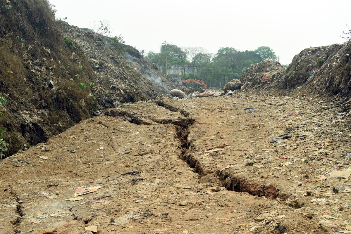 Cracks have developed on the roads nearby after the land subsidence.