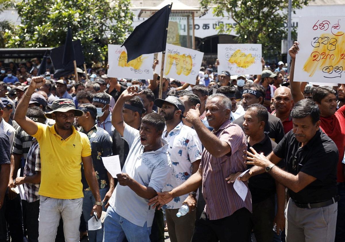 Trade union members during a protest against the big hikes in taxes and electricity rates, in Colombo in February. 
