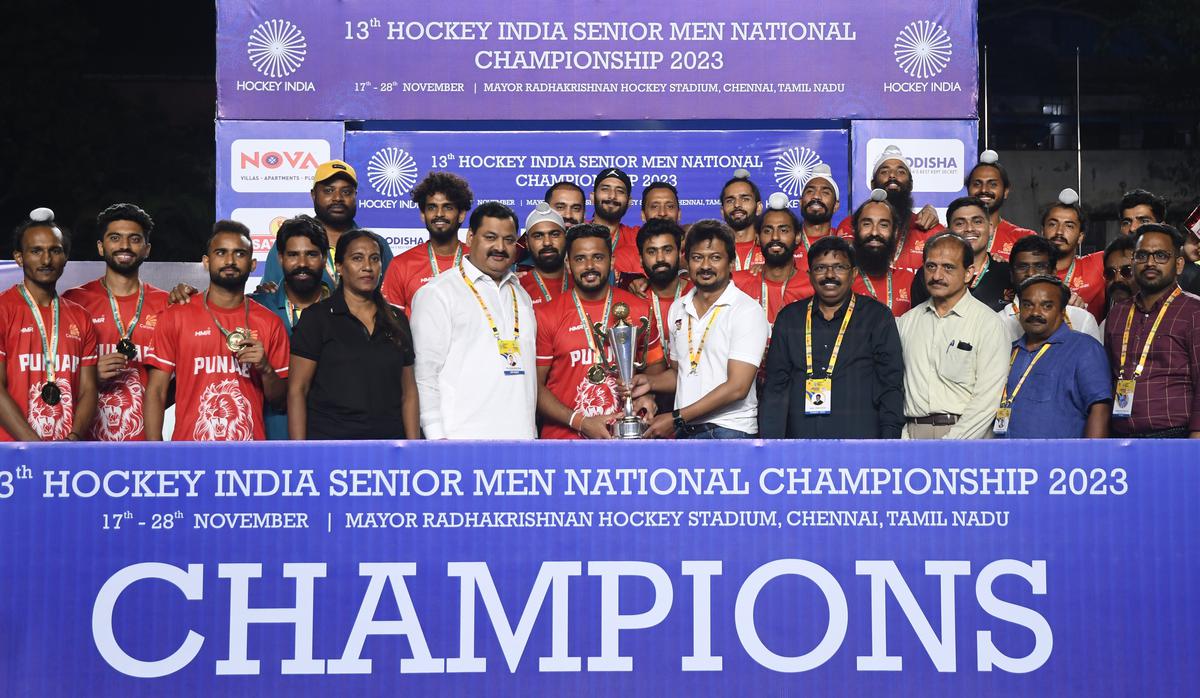 The Punjab team receives the winner’s trophy from Tamil Nadu Sports Minister Udhayanidhi Stalin after the 13th Hockey India senior men’s National Championship 2023 at the Mayor Radhakrishnan Stadium, in Chennai on Tuesday, November 28, 2023.