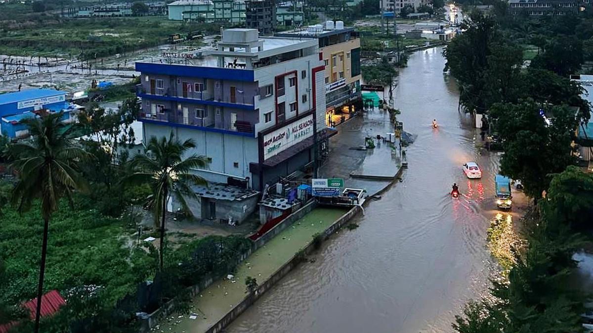 Potholes worsen traffic on flooded roads in Bengaluru city