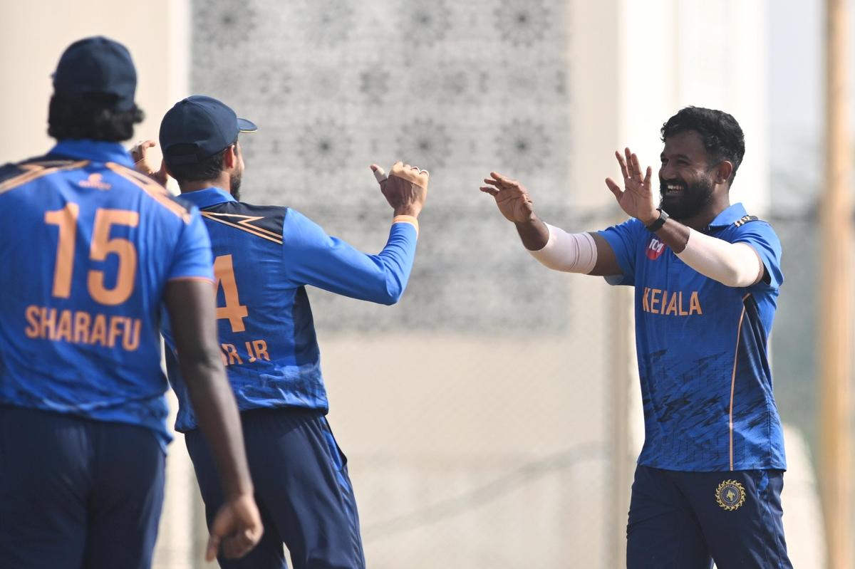 Kerala pacer K.M. Asif celebrates after dismissing Mumbai skipper Shardul Thakur.