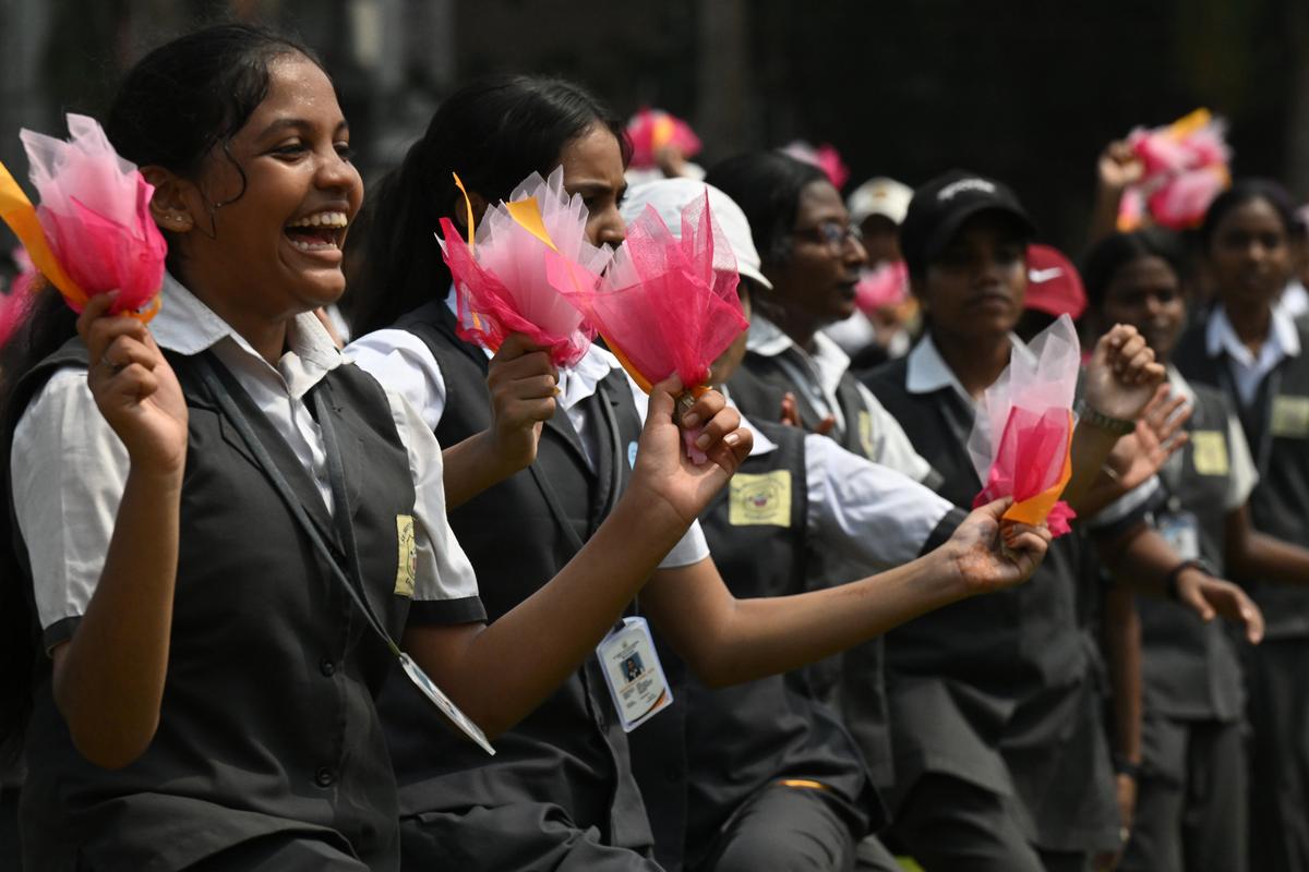 Students participating in rehearsals at the stadium.