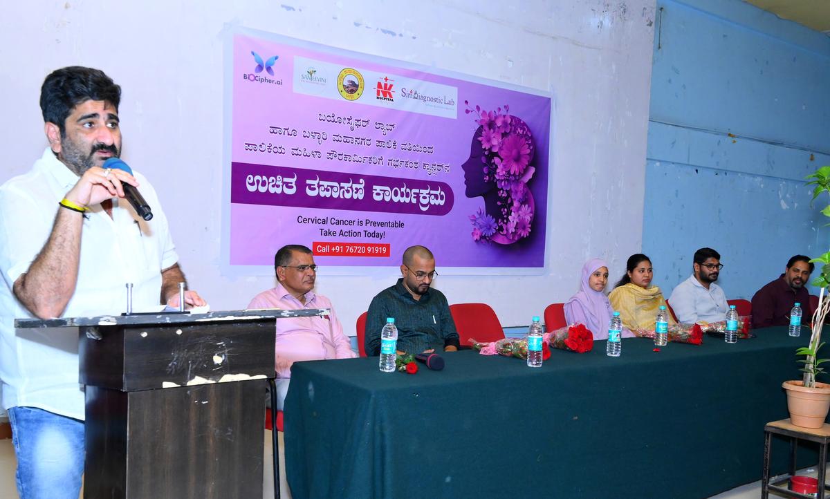 Mayor Mullangi Nandish speaks at a free health check bootcamp organized for female citizen workers on March 25, 2025 at the football field in Ballari. 