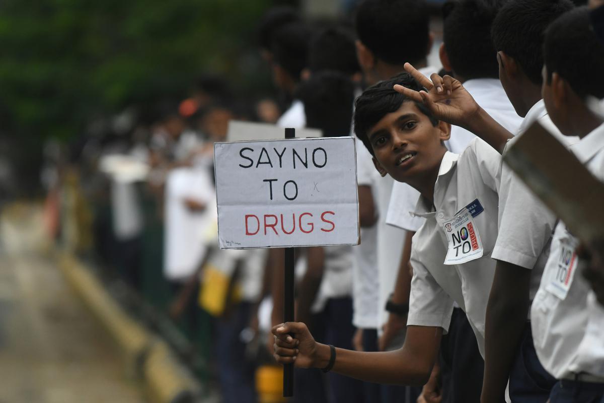 Students participate in a human chain against drugs in Kochi. 