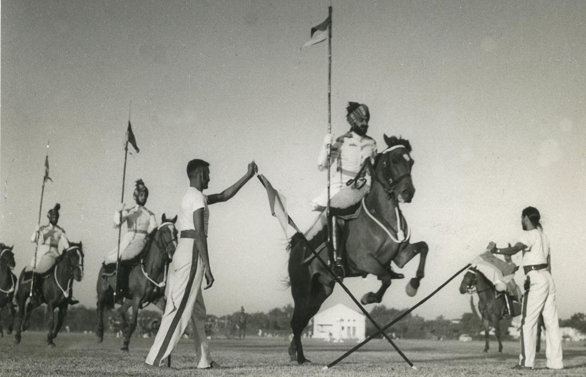 A scene during the musical ride by the President Bodyguard at the Mounted Gymkhana held on November 29, 1959 at Jaipur Polo ground, New Delhi. A scene during the musical ride by the President Bodyguard at the Mounted Gymkhana held on November 29, 1959 at Jaipur Polo ground, New Delhi.