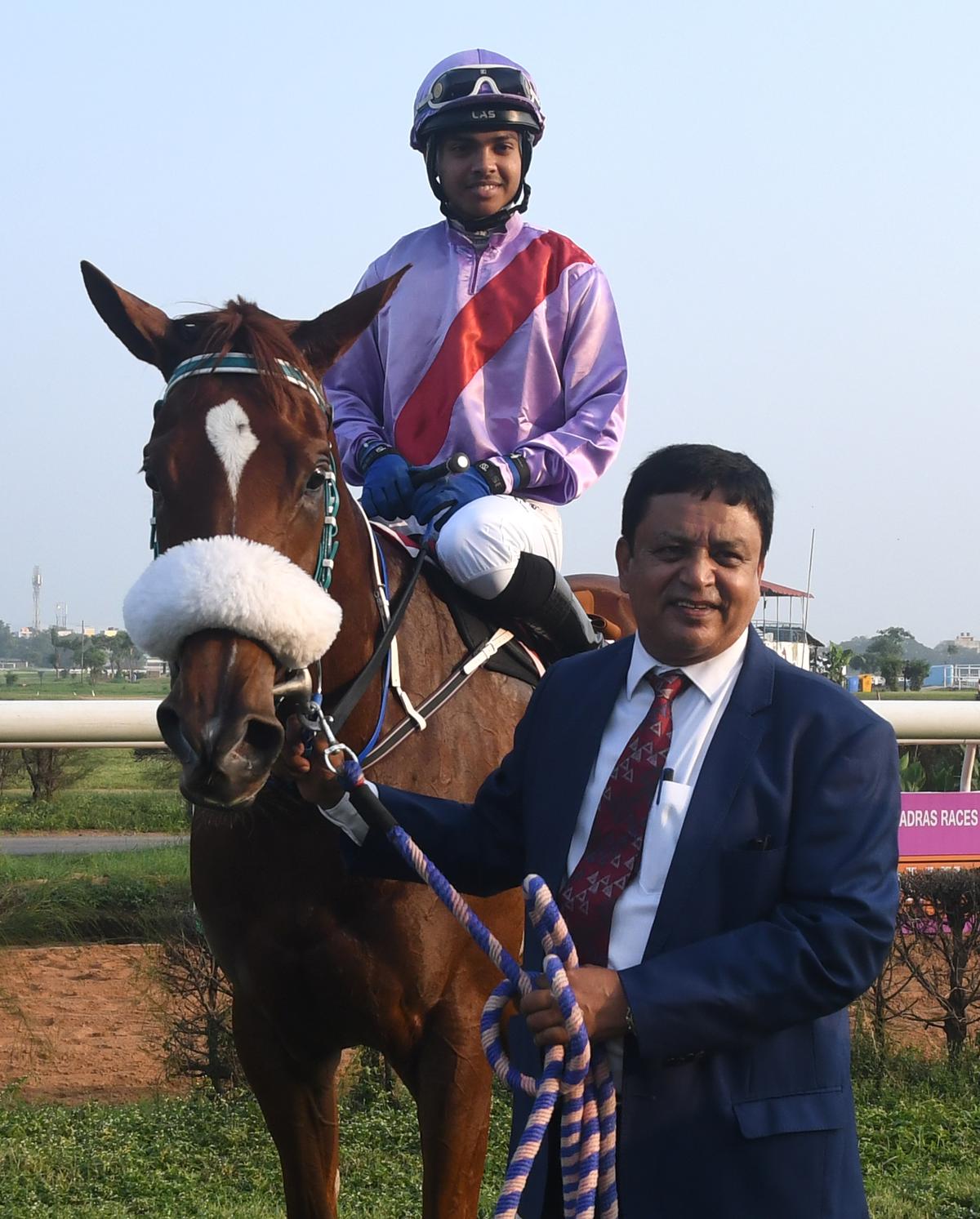 Worthy champion: Trainer J. Sebastian leading in Something Royal (Vivek astride) after the win in the South India Oaks.