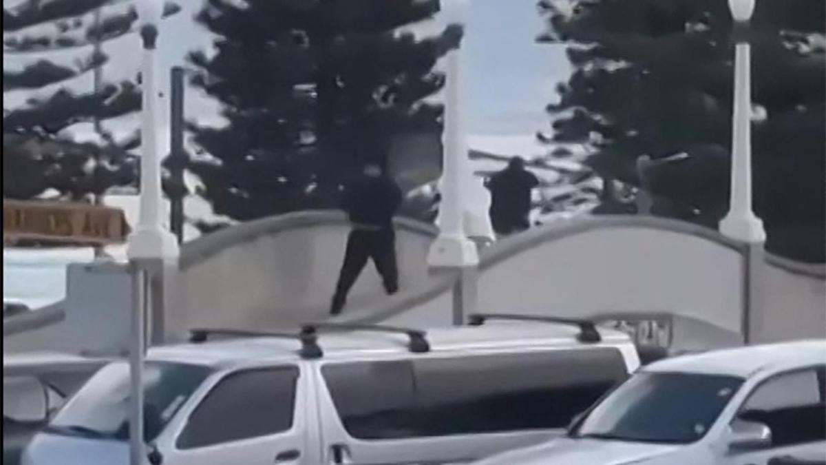 Gunmen kill nine at Sydney's Bondi Beach, causing chaos and panic; one shooter dead, another arrested amid investigation.