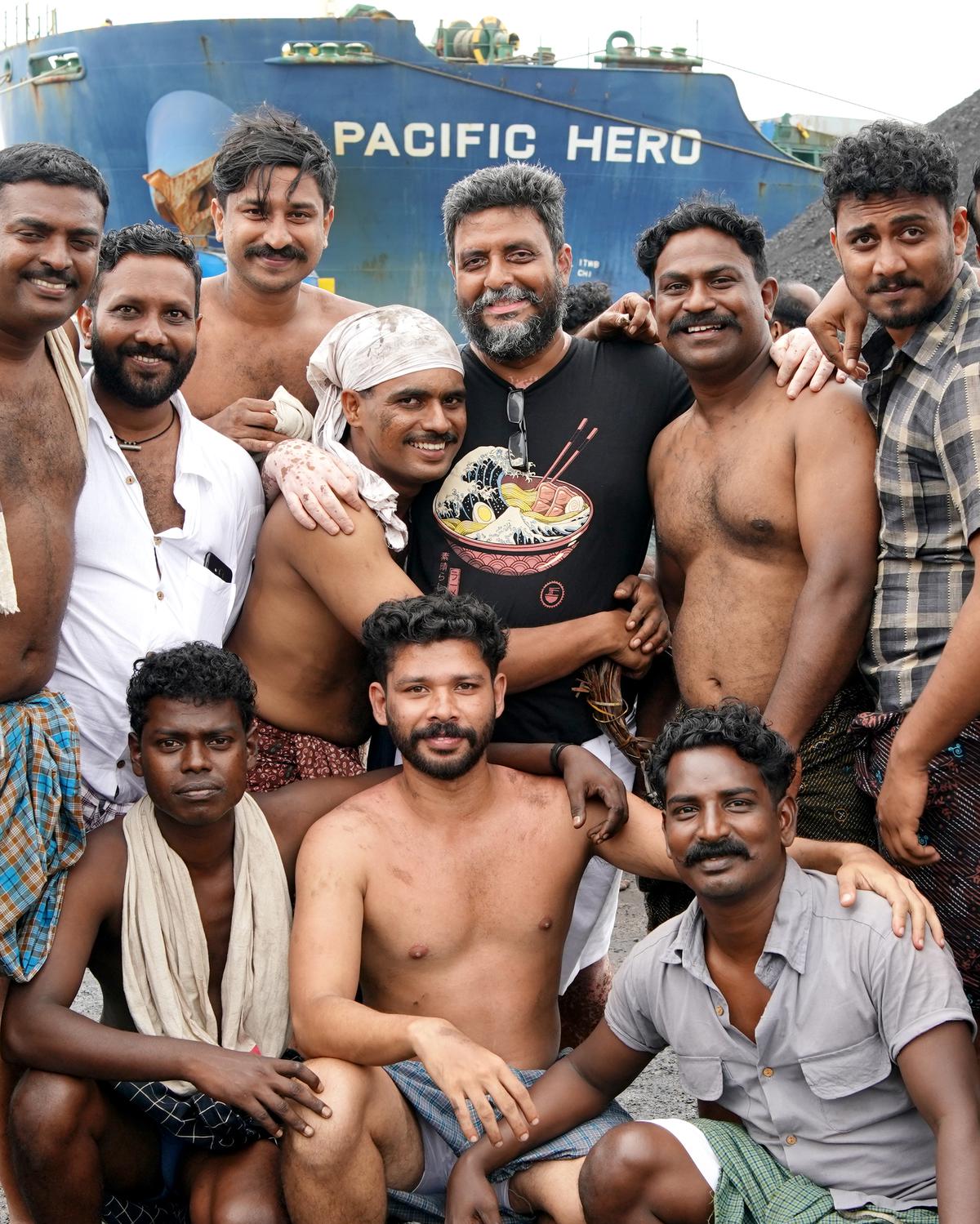 Gopan Chidambaram (centre) with actors who played the port workers in ‘Thuramukham’