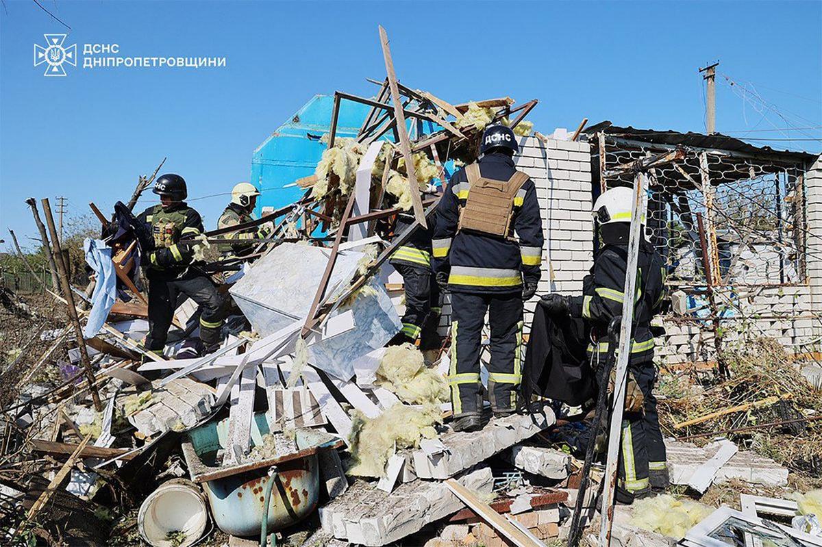 This handout photograph taken and released by the Ukrainian Emergency Service on August 26, 2024 shows rescuers working at the site of a missile attack at an undisclosed location in Dnipro region of Ukraine. 