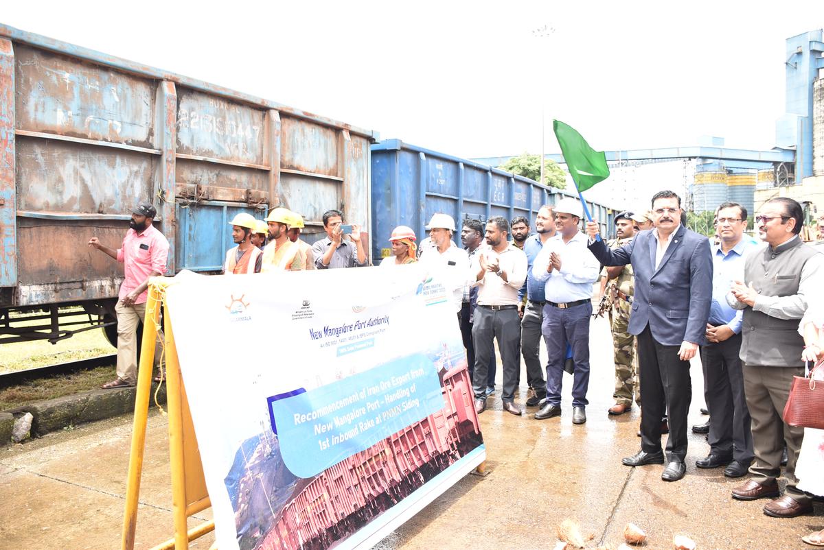 New Mangalore Port Authority Chairman A.V. Ramana receives the first iron-ore filled rake from Chitradurga mines for export on Thursday.