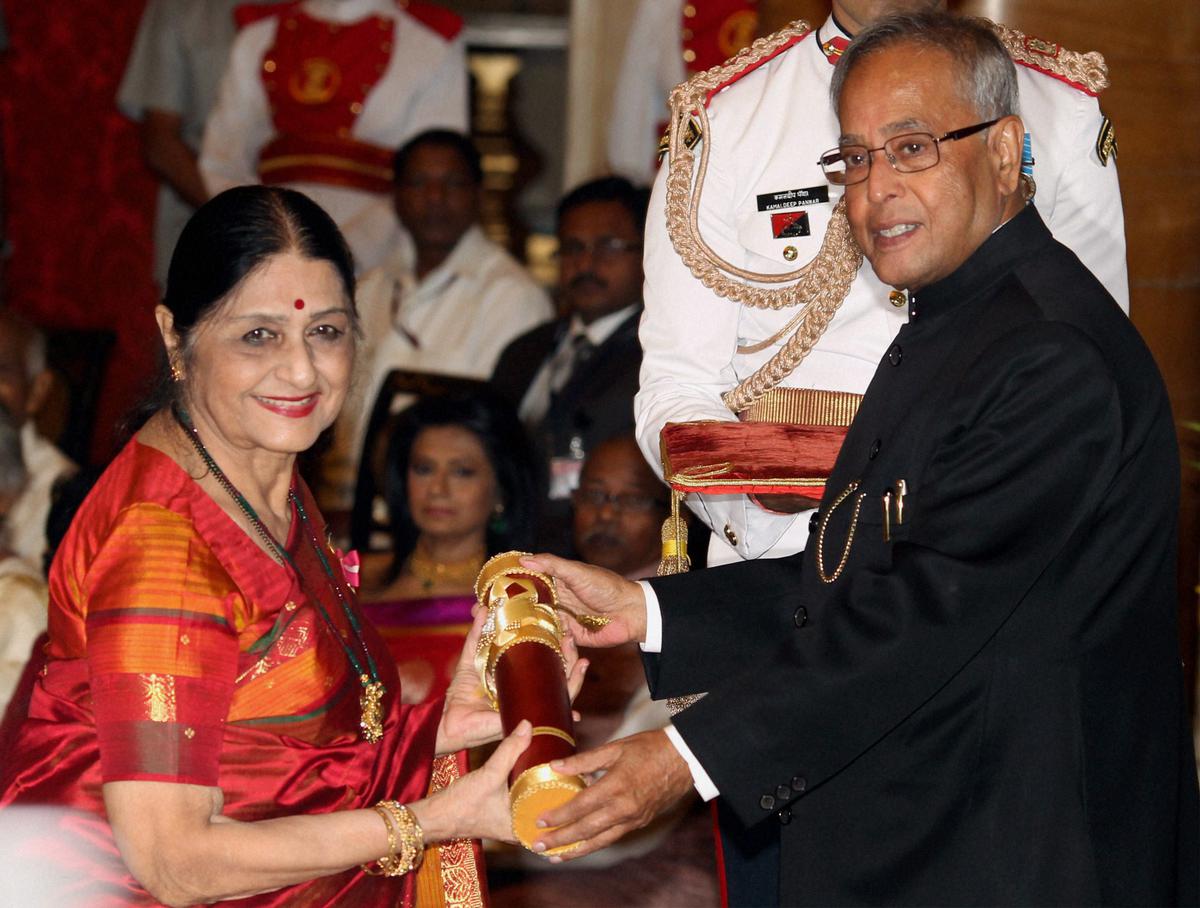 The then President Pranab Mukherjee presents the Padma Bhushan to Kanak Rele in 2013 