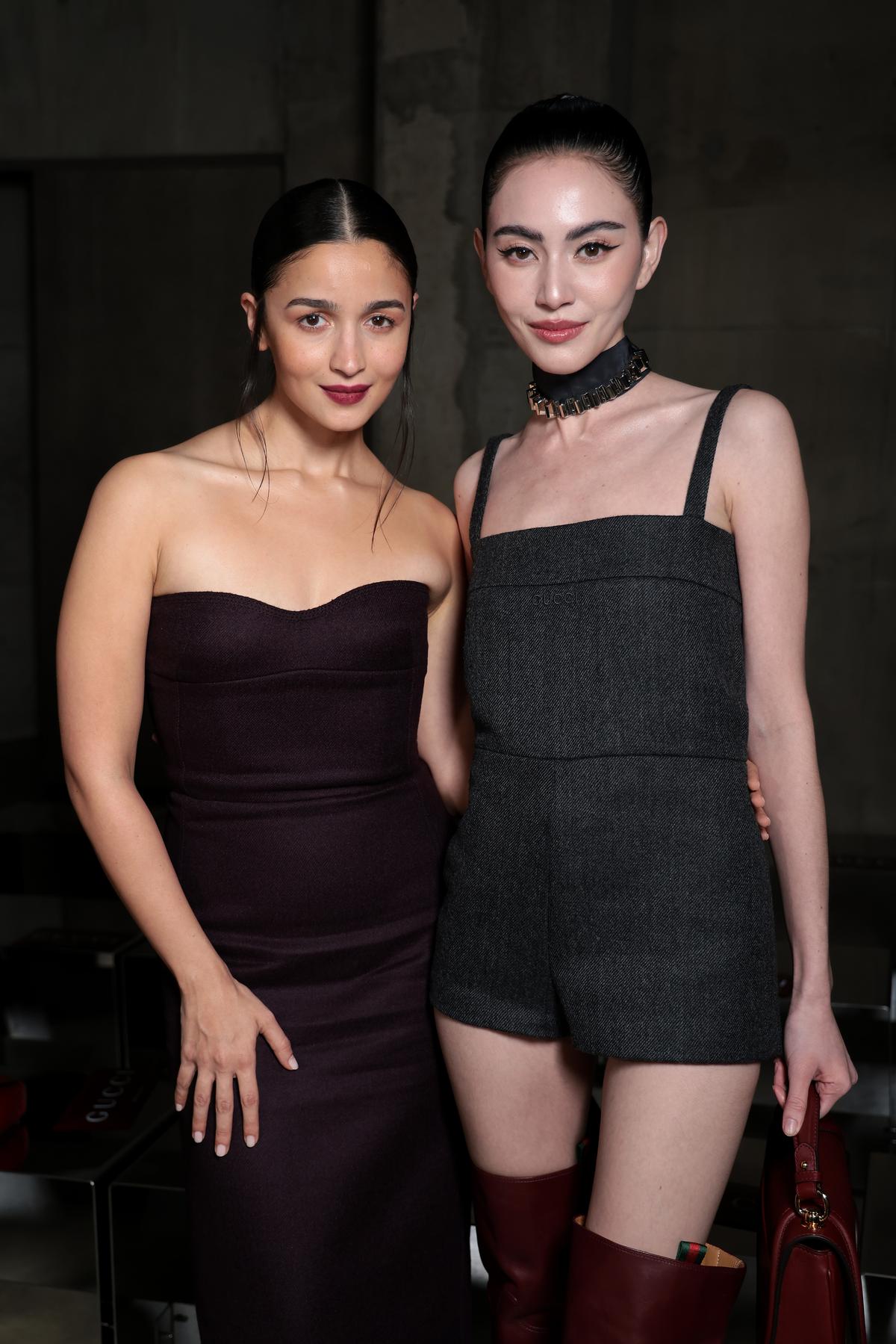Alia Bhatt and Davika Hoorne pose for a photograph at the Gucci Cruise 2025 Fashion Show at Tate Modern on May 13, 2024 in London, England.