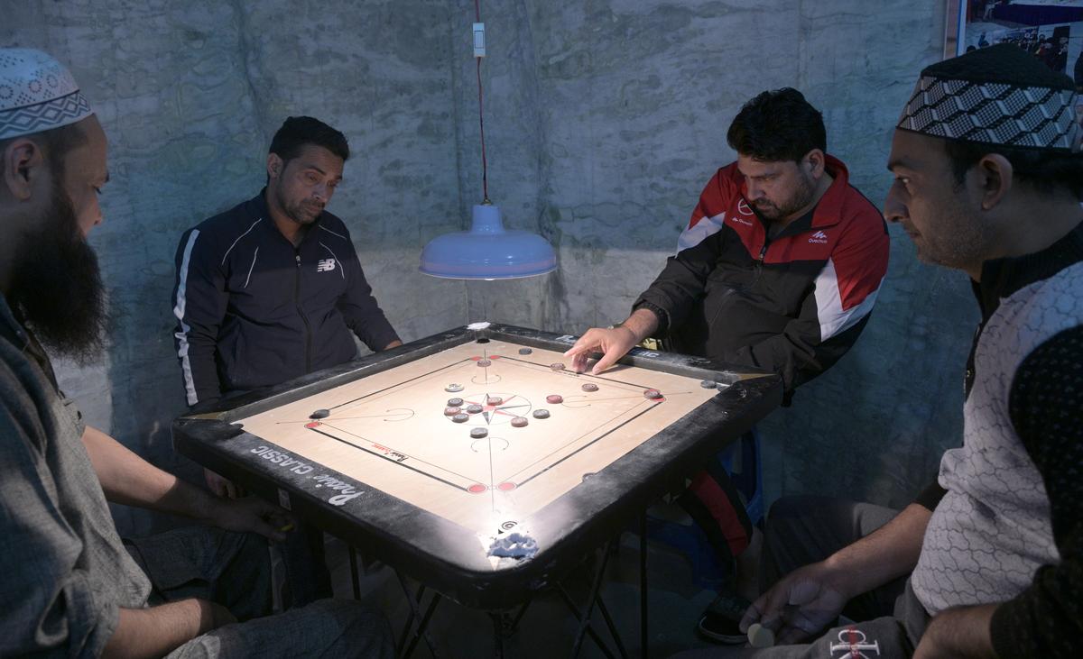 A carrom game in full swing at one of the clubs in Old Delhi. 