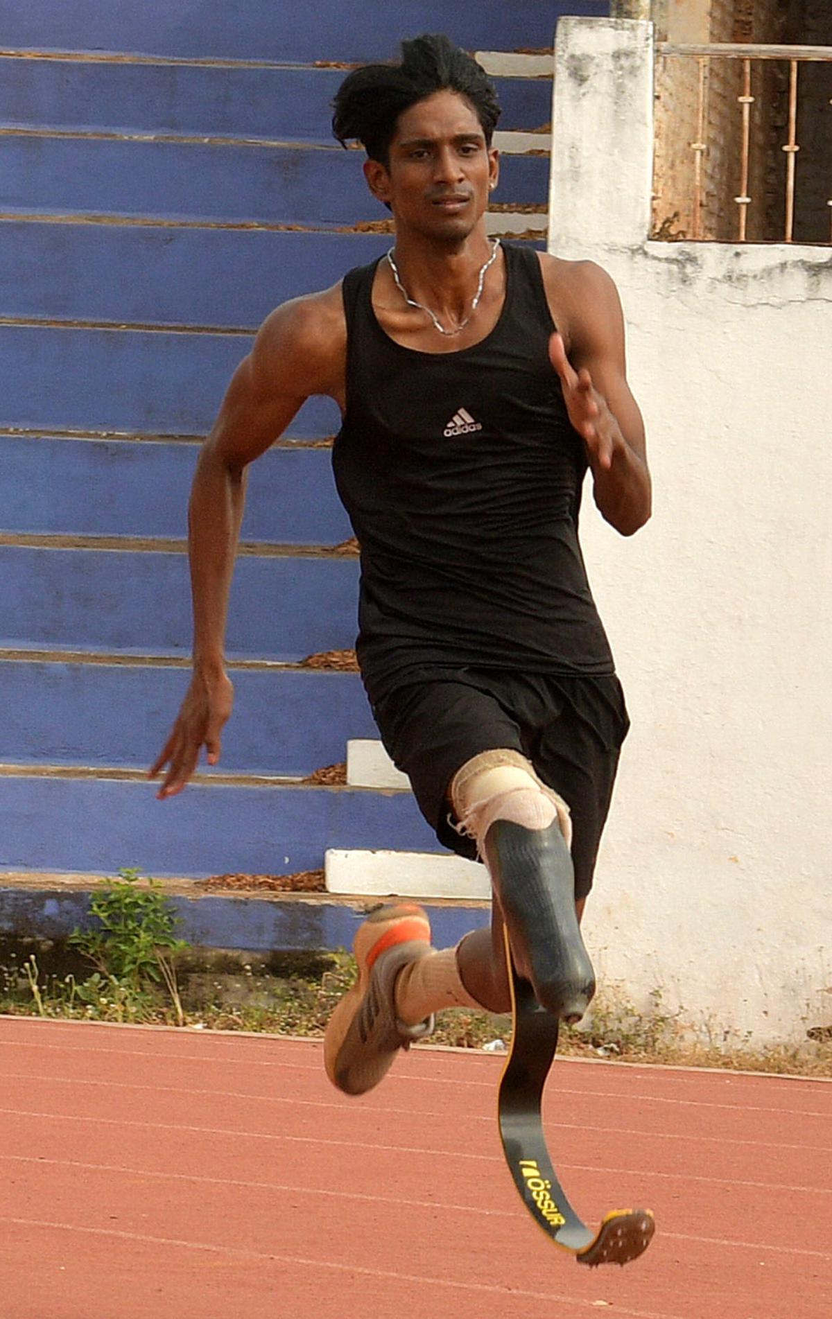 K. Kalaiselvan, 25, runs with the prosthetic blade provided by Tamil Nadu Minister of Youth Welfare and Sport Udhayanidhi Stalin. 