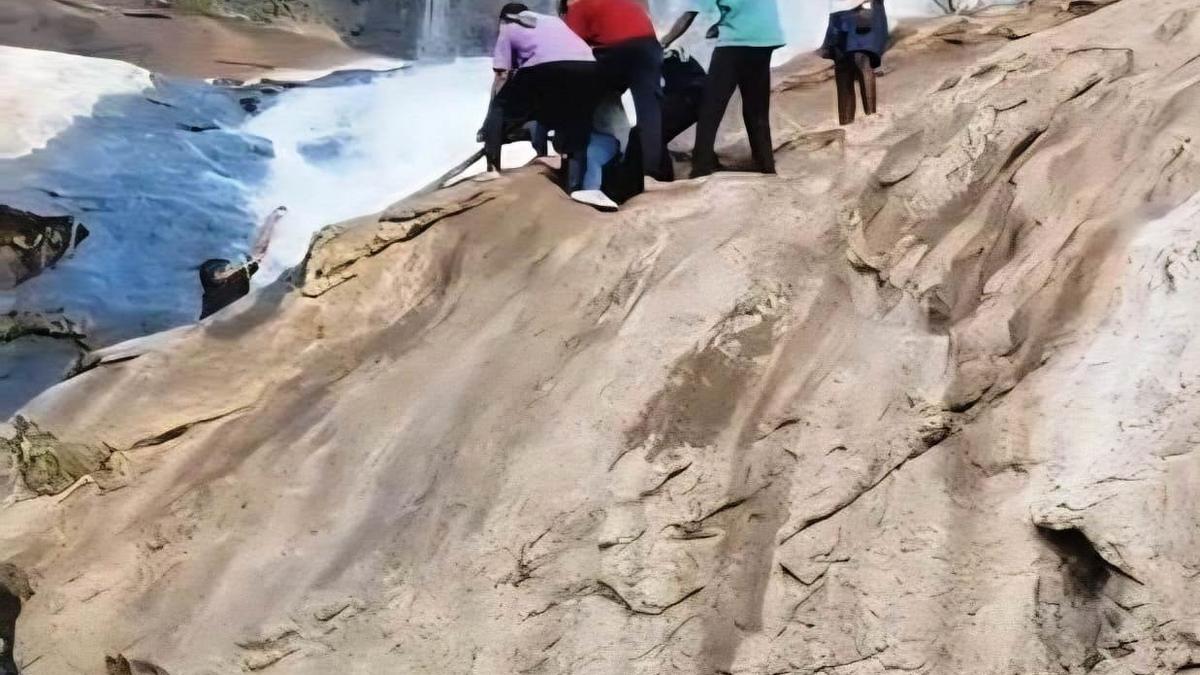 Local people rescue Tamil Nadu tourist who slipped in Thooval waterfall