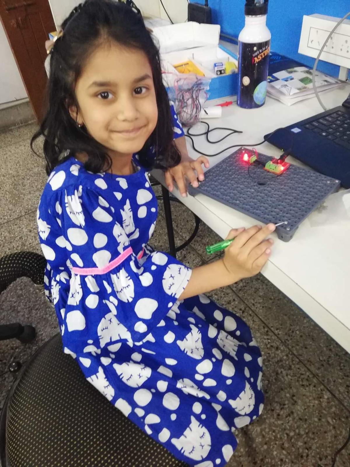 Manishka Dubey tinkering at a young age. Manishka Dubey tinkering at a young age.