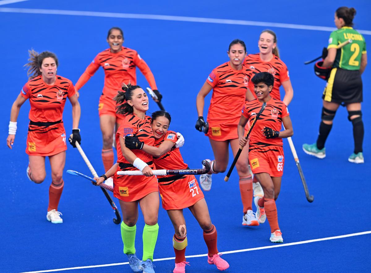 Shrachi Bengal Tigers player Agustina Gorzelany is mobbed by teammates during the Hockey India League (Women) match against Ranchi Royals at the Birsa Munda Hockey Stadium in Ranchi, Jharkhand, on Sunday, January 04, 2025.