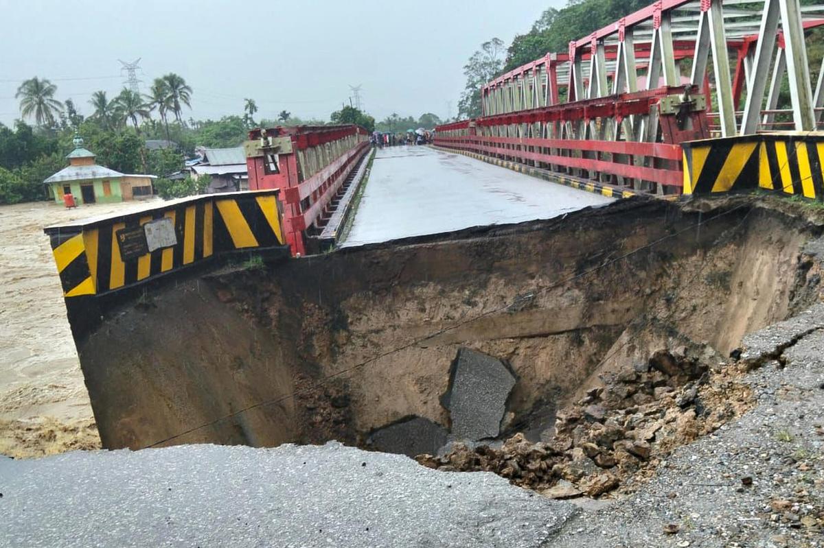This photo released by National Agency for Disaster Countermeasure (BNPB) shows a bridge destroyed by a flash flood at North Tapanuli, North Sumatra Province, Indonesia on November 25, 2025.. Photo: BNPB via AP