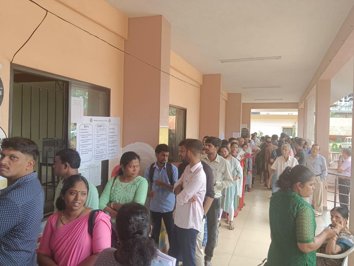 Voters gathered at a polling booth at​ Board High School during Legislative Council elections, in ​Udupi on Monday.