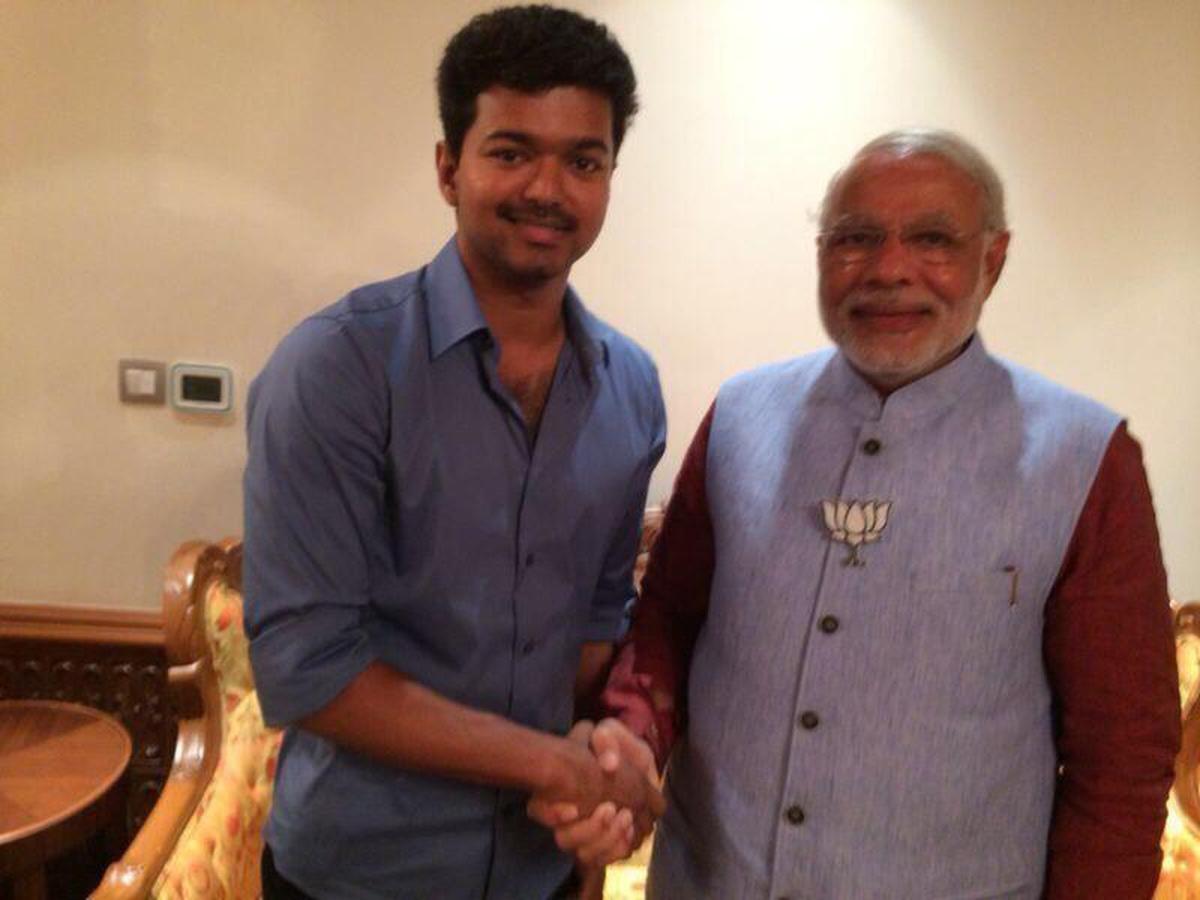 Vijay with Narendra Modi in April 2014. File photo